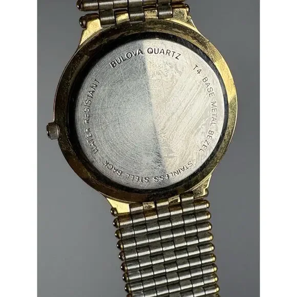Bulova Men's Gold-Tone Diamond Accent Watch, model number 97D127.